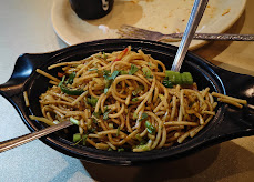 Hakka noodles tossed in our wok
